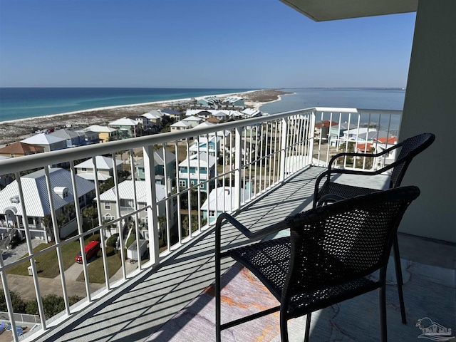 balcony featuring a water view