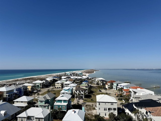 drone / aerial view featuring a water view and a residential view