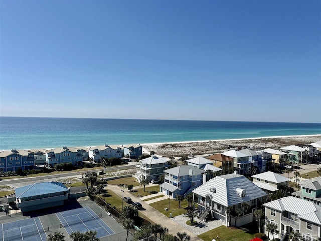 bird's eye view featuring a residential view, a water view, and a beach view