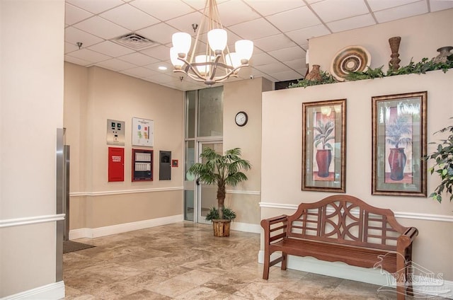 building lobby featuring visible vents