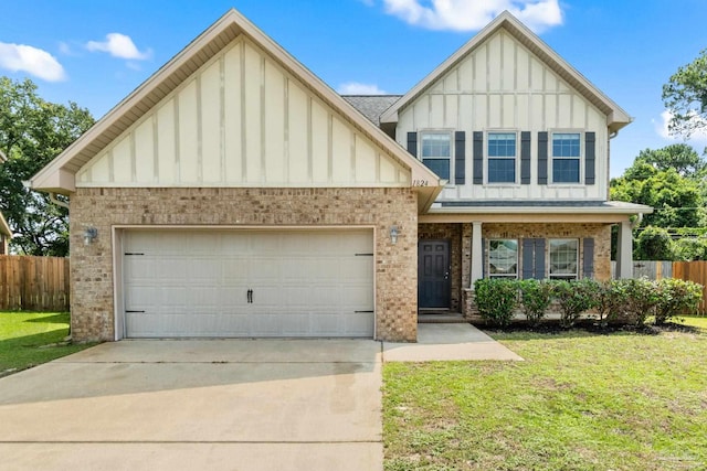 1824 Lindsey Magnolia Ct, Navarre, FL 32566 - view of front facade with board and batten siding, brick siding, a garage, and concrete driveway