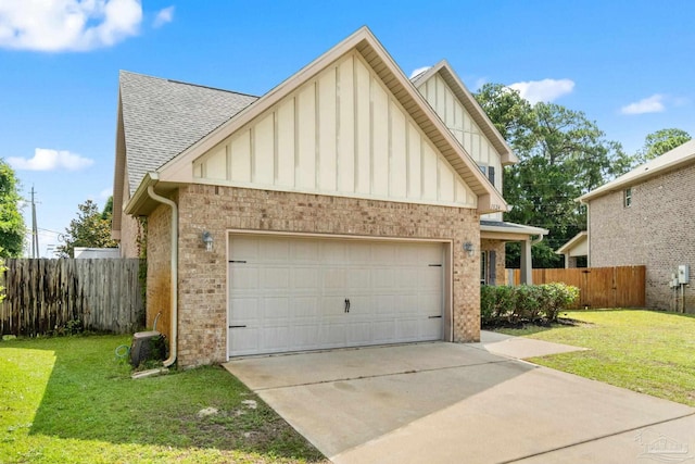 1824 Lindsey Magnolia Ct, Navarre, FL 32566 - view of front of house featuring a garage, board and batten siding, brick siding, and driveway