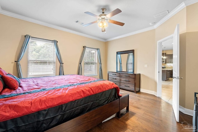 1824 Lindsey Magnolia Ct, Navarre, FL 32566 - bedroom with ornamental molding, wood finished floors, baseboards, and ceiling fan