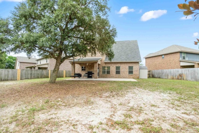 1824 Lindsey Magnolia Ct, Navarre, FL 32566 - rear view of house featuring a patio and a fenced backyard