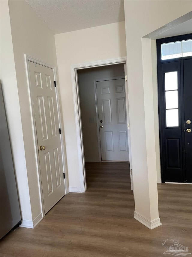 foyer entrance featuring hardwood / wood-style flooring