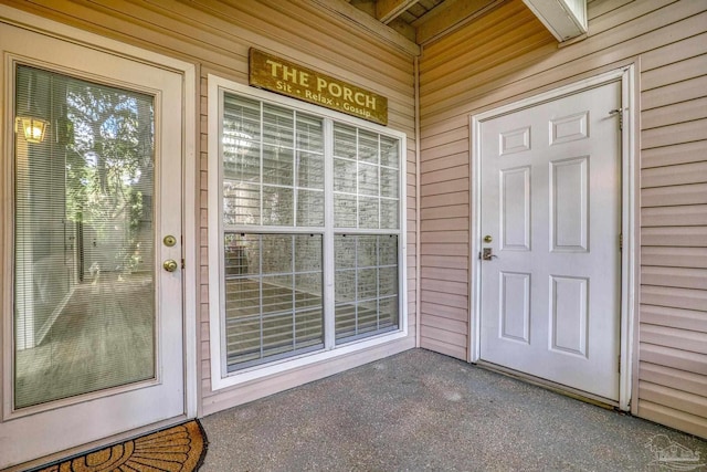 entrance to property with a porch