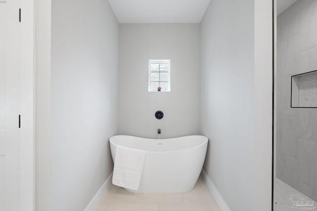 bathroom featuring independent shower and bath and tile patterned floors