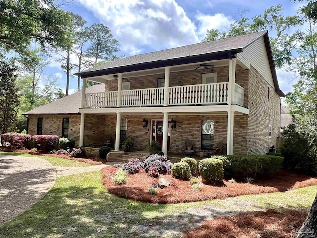 39 Blithewood Dr, Pensacola, FL 32514 - front of property with a balcony, a porch, a ceiling fan, and brick siding