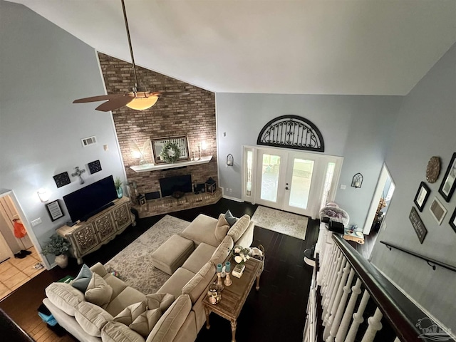 39 Blithewood Dr, Pensacola, FL 32514 - living area featuring high vaulted ceiling, a fireplace, a ceiling fan, and french doors