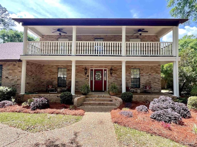 39 Blithewood Dr, Pensacola, FL 32514 - view of front facade featuring a balcony, ceiling fan, and covered porch