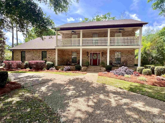 39 Blithewood Dr, Pensacola, FL 32514 - view of front of property with a balcony, a ceiling fan, covered porch, and brick siding