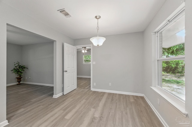 6257 Mohawk Trl, Milton, FL 32583 - unfurnished room featuring light wood-style floors, baseboards, and ceiling fan