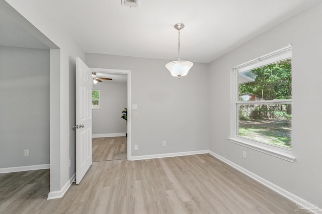 6257 Mohawk Trl, Milton, FL 32583 - empty room with light wood-type flooring and baseboards
