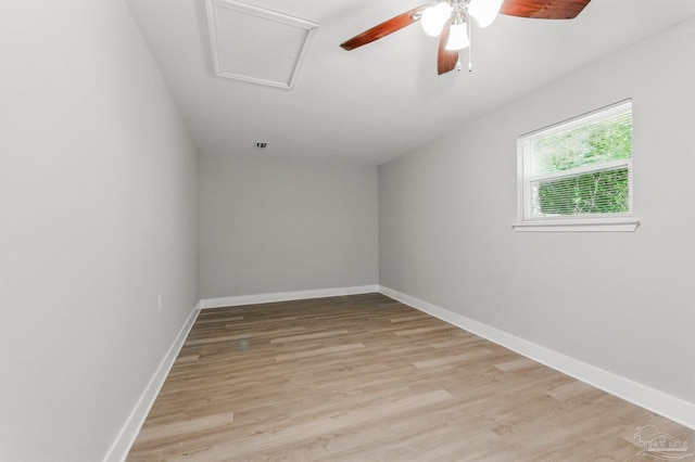 6257 Mohawk Trl, Milton, FL 32583 - spare room with light wood finished floors, ceiling fan, and baseboards