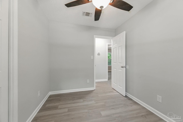 6257 Mohawk Trl, Milton, FL 32583 - unfurnished room featuring light wood finished floors, ceiling fan, and baseboards