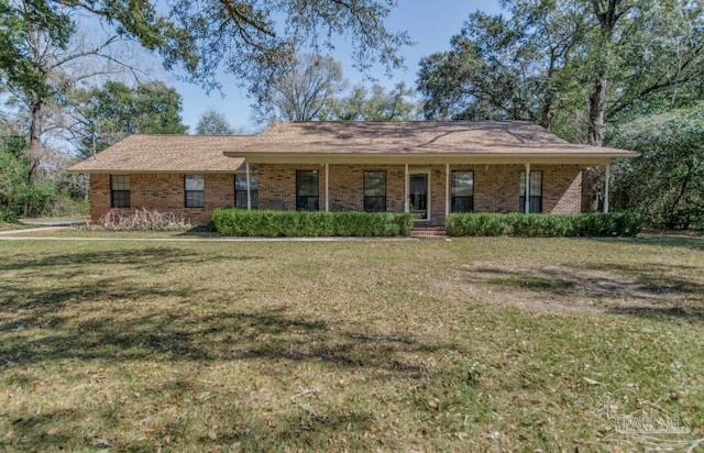 single story home featuring brick siding and a front lawn