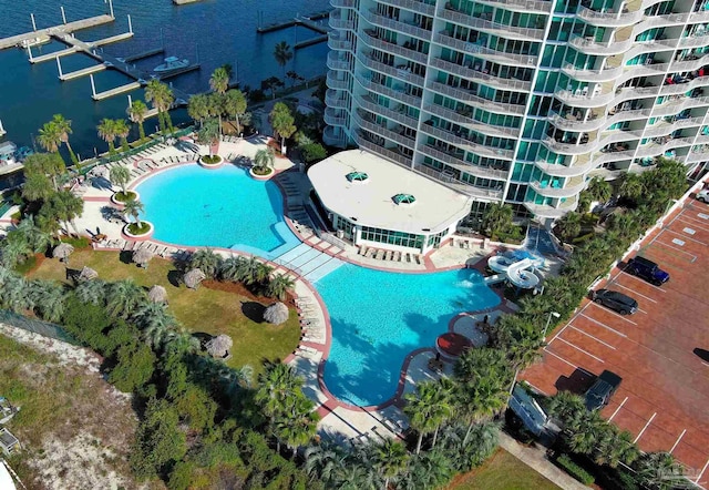 birds eye view of property with a water view