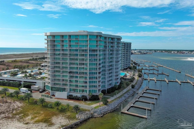 view of building exterior with a water view