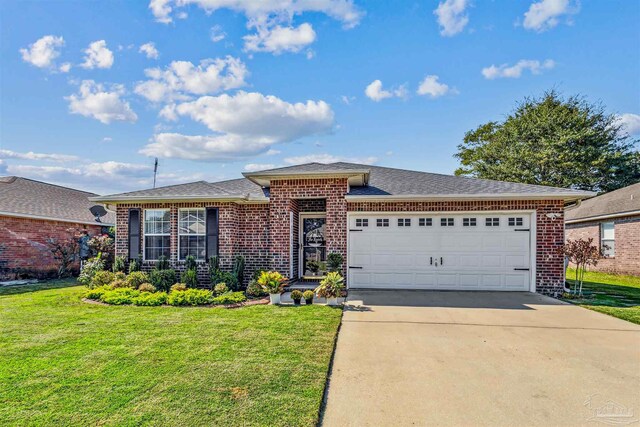 ranch-style house with a front yard and a garage