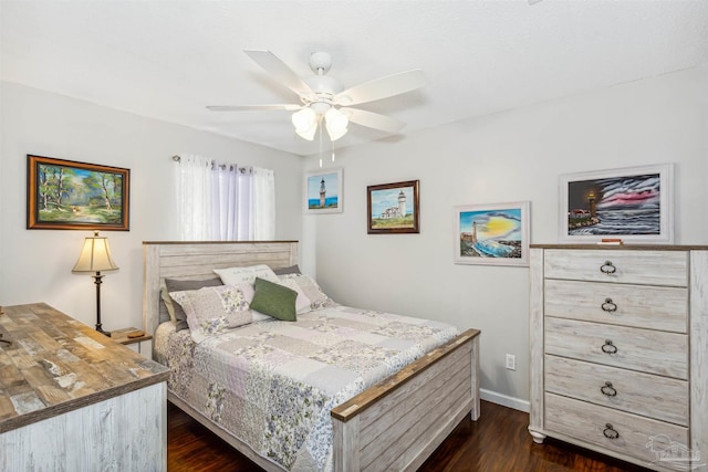 bedroom with ceiling fan and dark hardwood / wood-style flooring