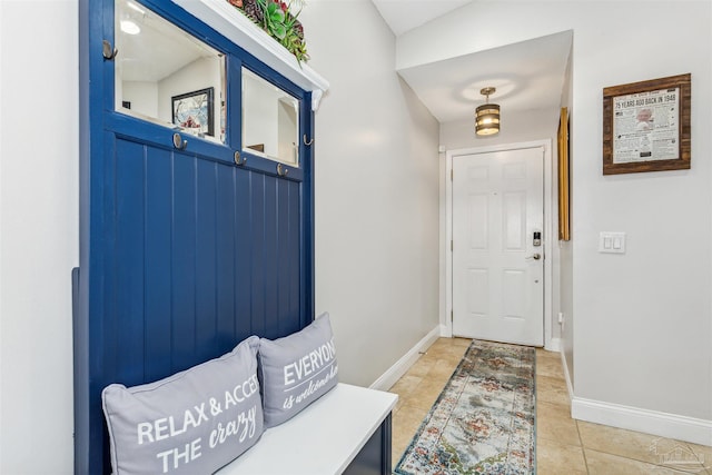 view of tiled foyer entrance