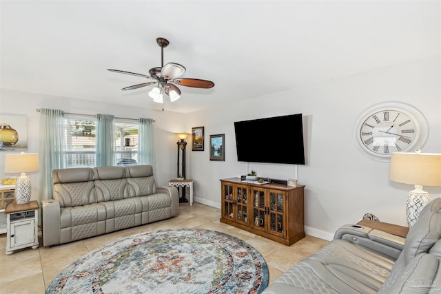 living room with light tile patterned floors and ceiling fan