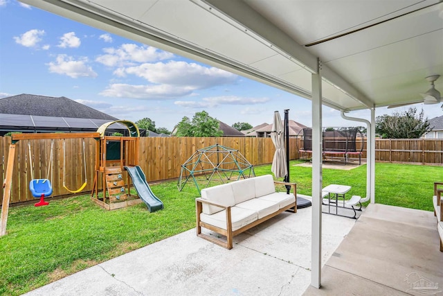 4121 Castle Gate Dr, Pace, FL 32571 - view of patio / terrace featuring a trampoline, a playground, outdoor lounge area, and a ceiling fan