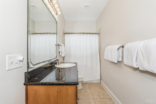 4121 Castle Gate Dr, Pace, FL 32571 - full bathroom featuring tile patterned floors, vanity, toilet, and baseboards