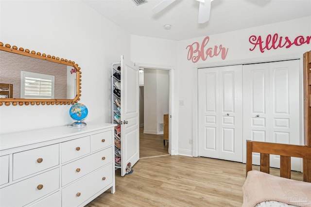4121 Castle Gate Dr, Pace, FL 32571 - bedroom with light wood-style floors, a closet, and a ceiling fan