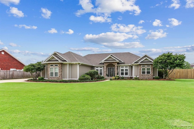 4121 Castle Gate Dr, Pace, FL 32571 - craftsman inspired home featuring stone siding and roof with shingles