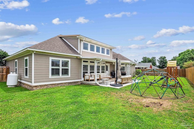 4121 Castle Gate Dr, Pace, FL 32571 - rear view of house with a shingled roof, a patio area, and a ceiling fan