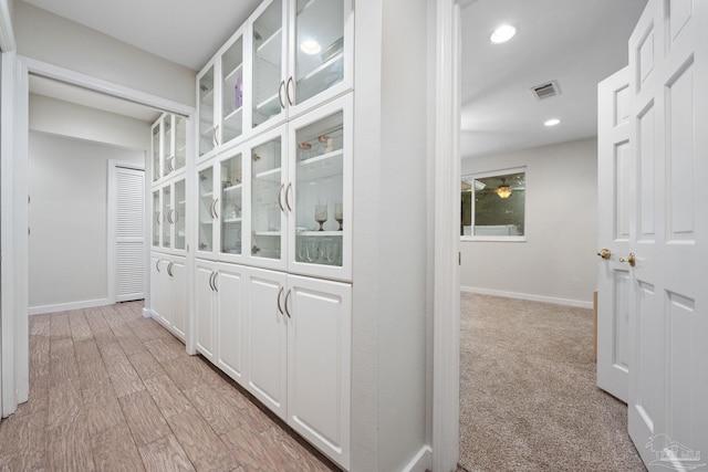 hallway featuring light wood-type flooring