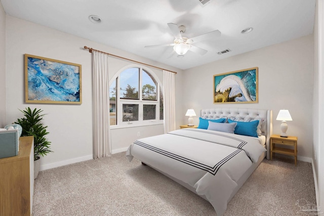 bedroom with light carpet and ceiling fan