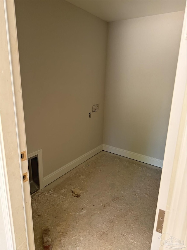 empty room featuring baseboards