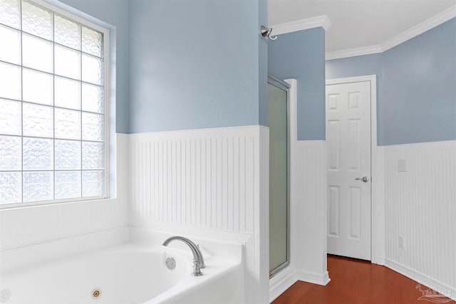 bathroom with plenty of natural light, shower with separate bathtub, and crown molding