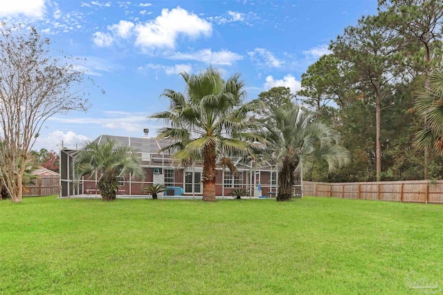 view of yard featuring a lanai