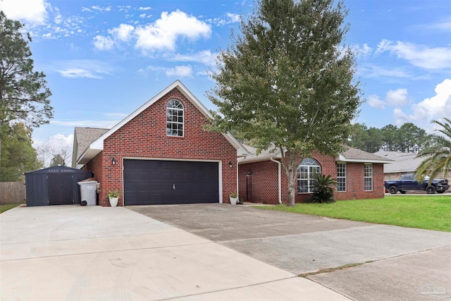 front facade with a front yard and a garage