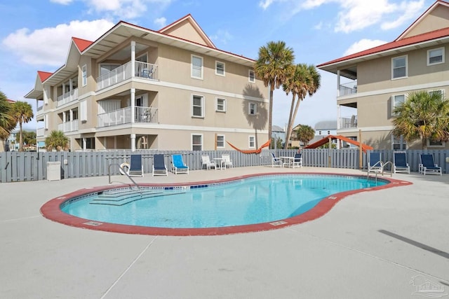 7464 Sunset Harbor Dr Unit 133, Navarre Beach, FL 32566 - view of swimming pool with a patio area