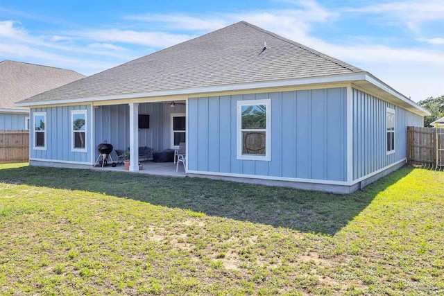 1346 Sea Grove Ct, Gulf Breeze, FL 32563 - rear view of property featuring board and batten siding, a patio area, and a shingled roof