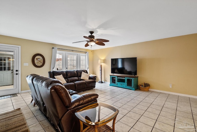 tiled living room featuring ceiling fan