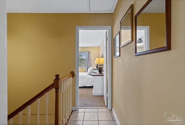 corridor with light carpet