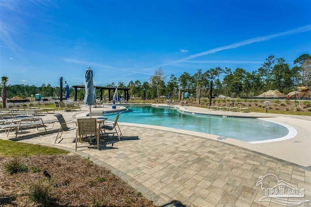 3594 Whitetail Ln, Pensacola, FL 32526 - community pool featuring a patio