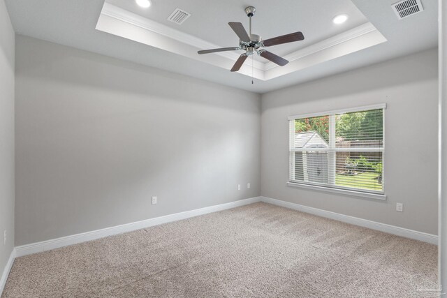 3594 Whitetail Ln, Pensacola, FL 32526 - unfurnished room featuring a raised ceiling, carpet, crown molding, ceiling fan, and recessed lighting