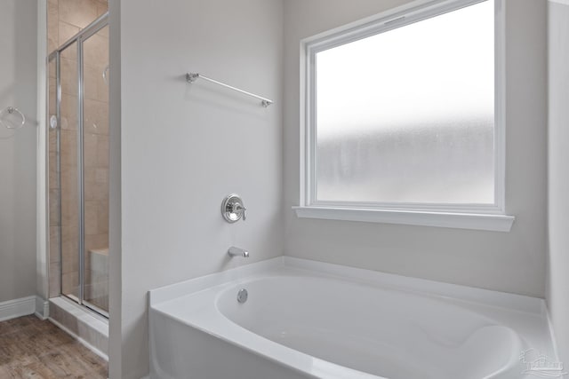 3594 Whitetail Ln, Pensacola, FL 32526 - bathroom featuring a garden tub and a shower stall