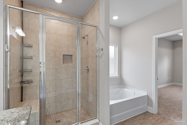 3594 Whitetail Ln, Pensacola, FL 32526 - full bath featuring a bath, a shower stall, and recessed lighting