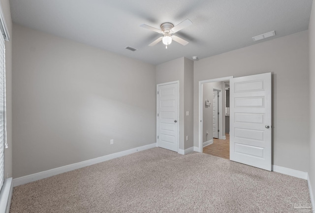 3594 Whitetail Ln, Pensacola, FL 32526 - unfurnished bedroom featuring carpet flooring and ceiling fan