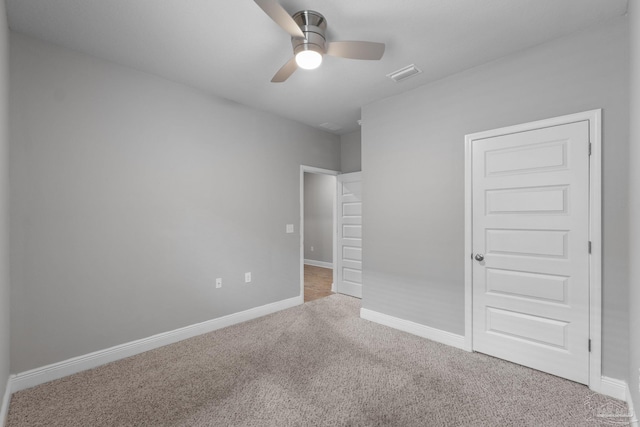 3594 Whitetail Ln, Pensacola, FL 32526 - unfurnished bedroom featuring carpet and a ceiling fan