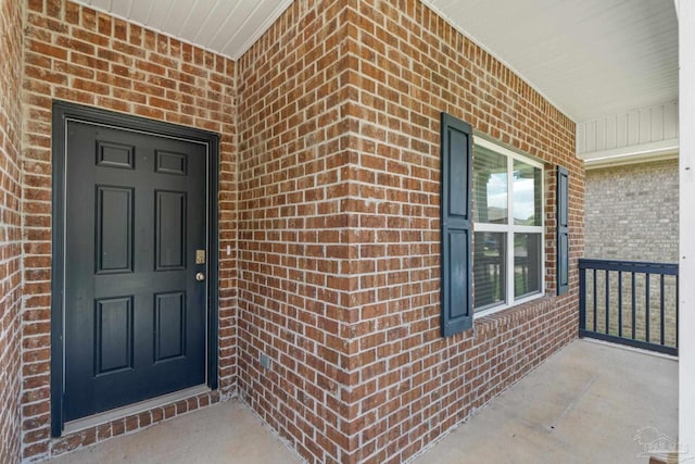 3594 Whitetail Ln, Pensacola, FL 32526 - view of exterior entry with covered porch and brick siding