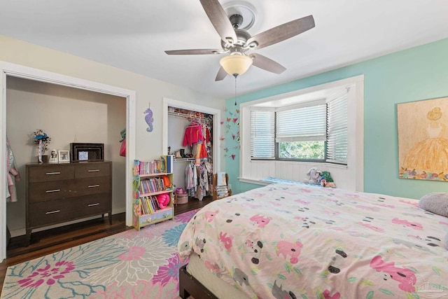 bedroom featuring a closet, ceiling fan, and dark hardwood / wood-style floors