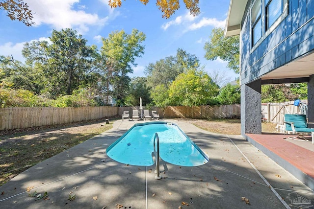 view of pool with a patio